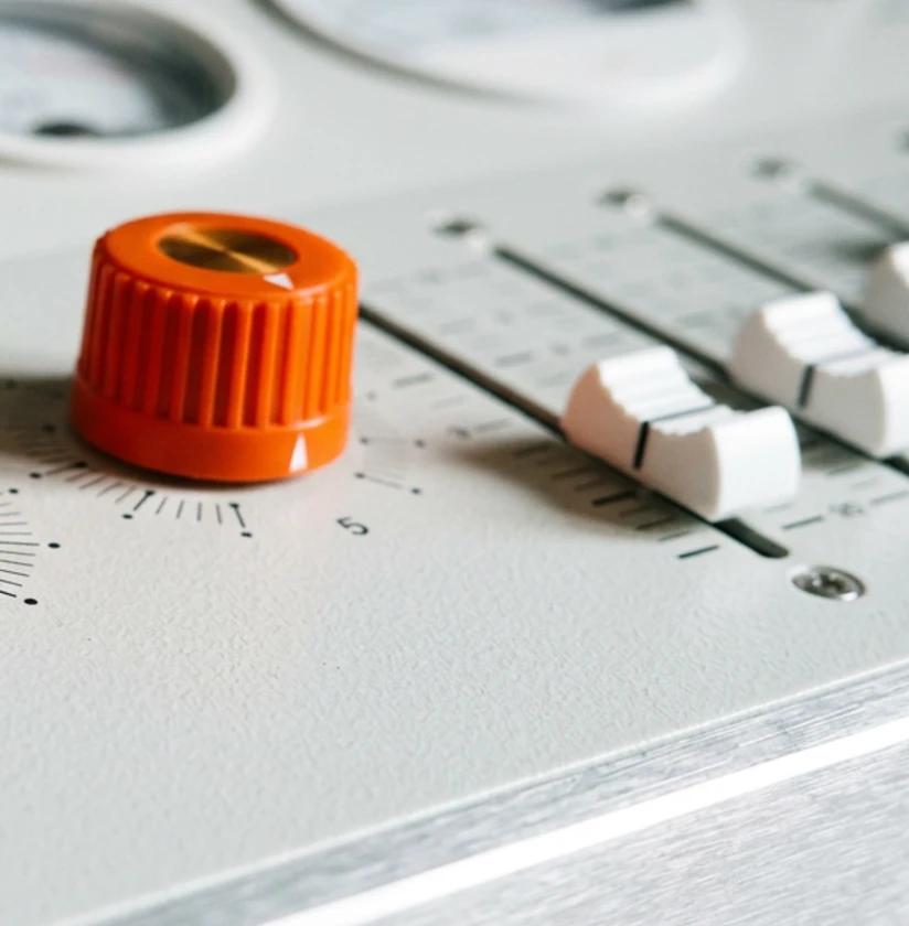 Orange dial on a mixing console